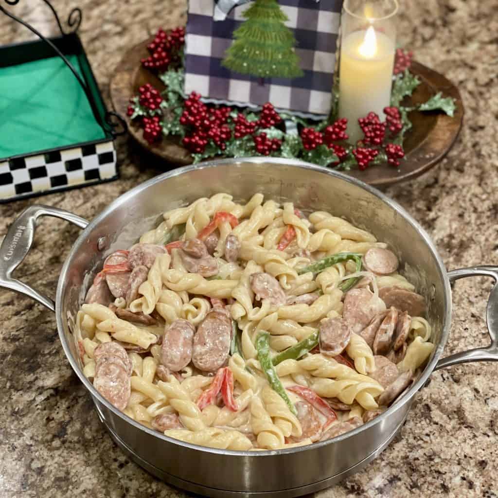 A pan of smoked sausage cajun alfredo pasta.