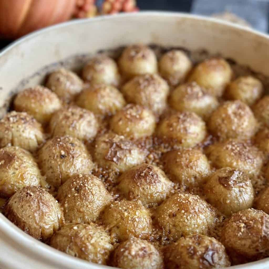 A close up shot of cheesy parmesan potatoes.