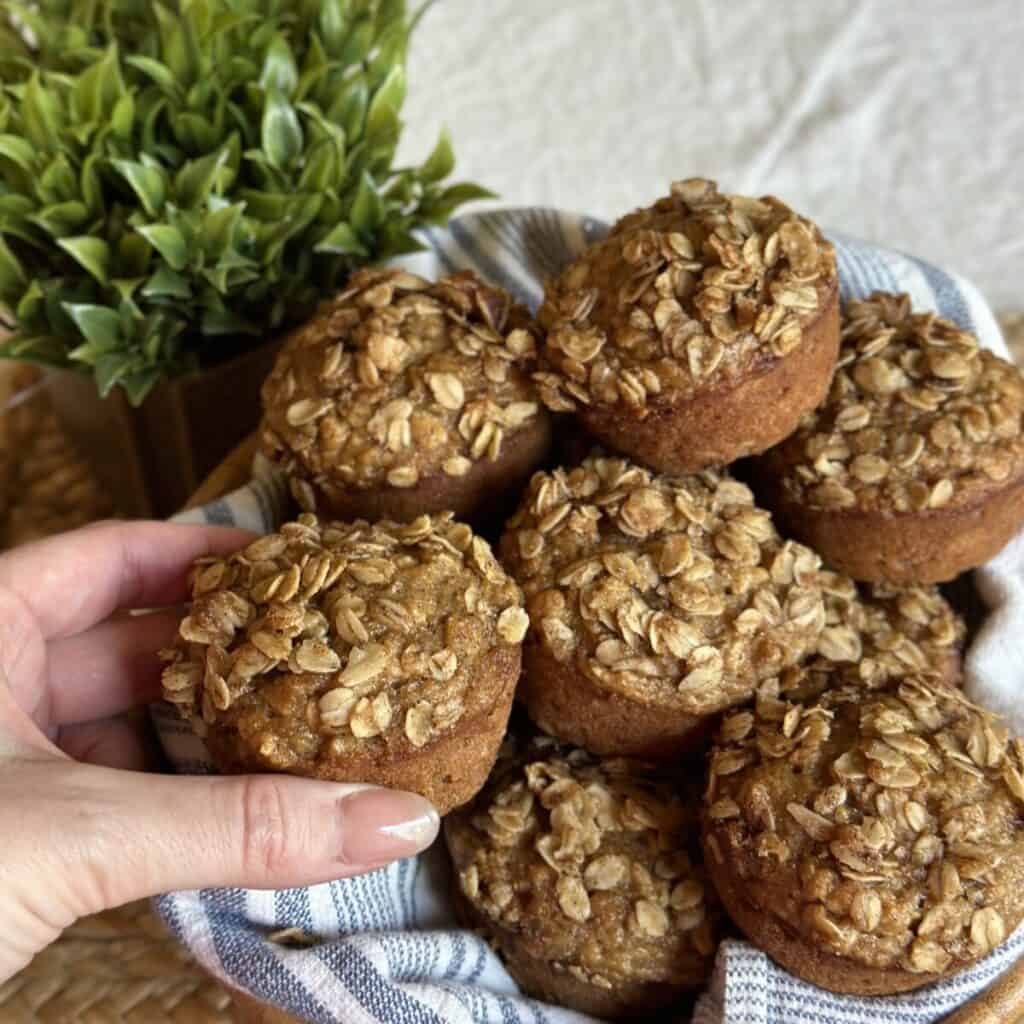 Grabbing a muffin.