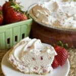 A slice of frozen yogurt pie on a plate.