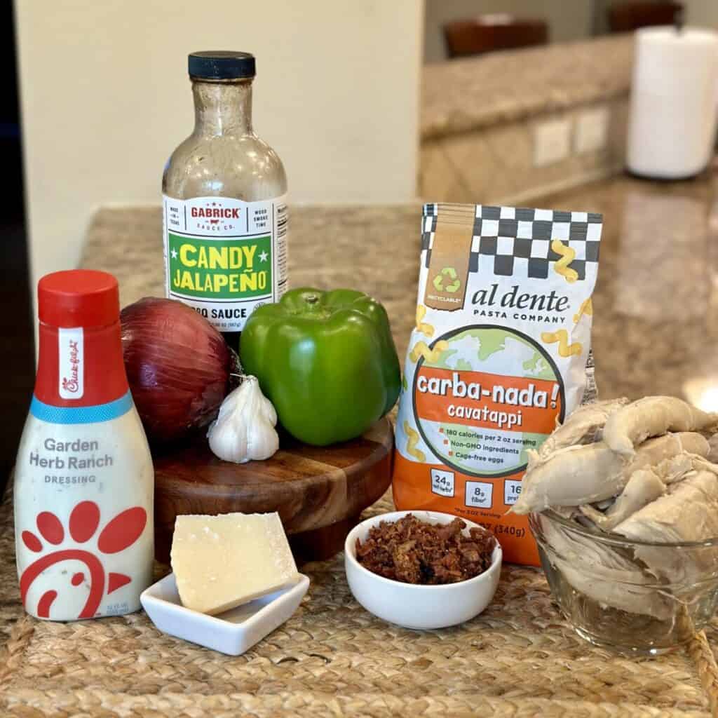 Ingredients to make barbecue chicken pasta salad.