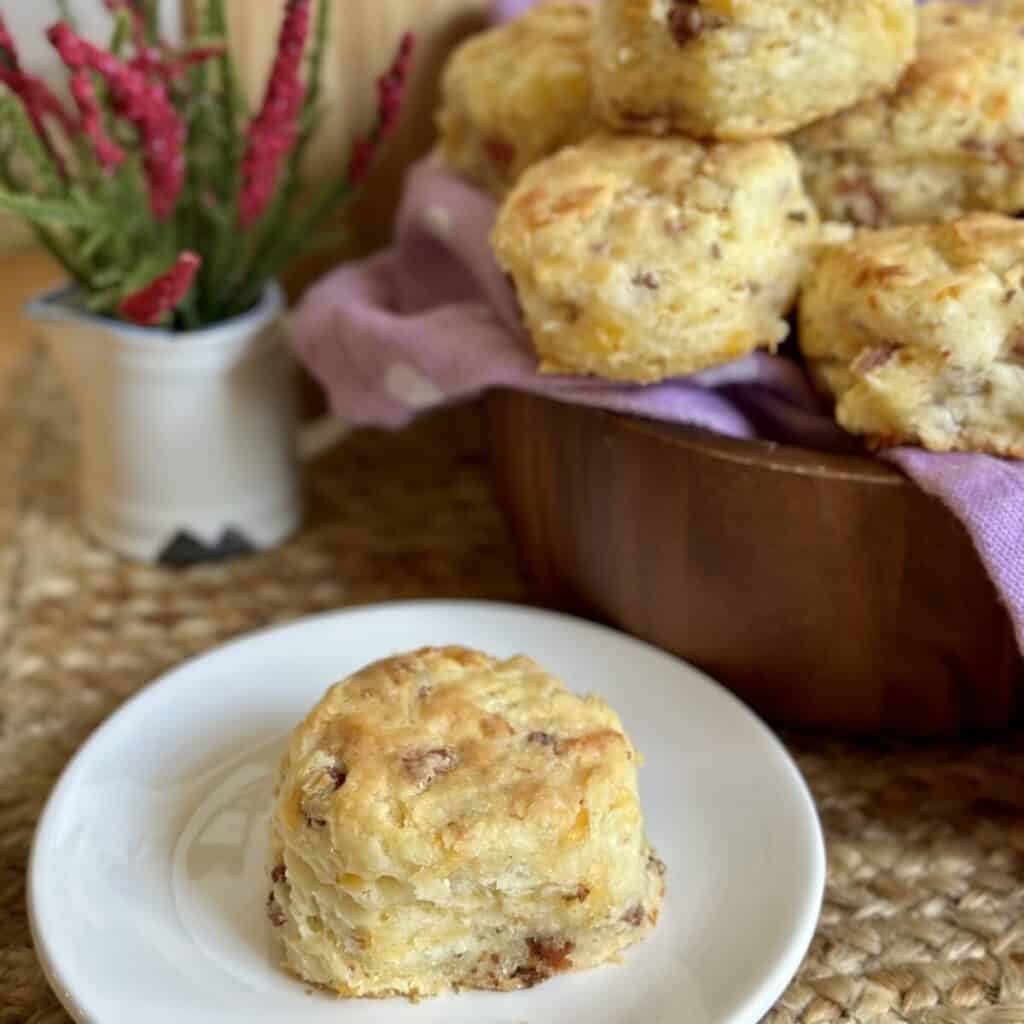 A biscuit on a saucer.