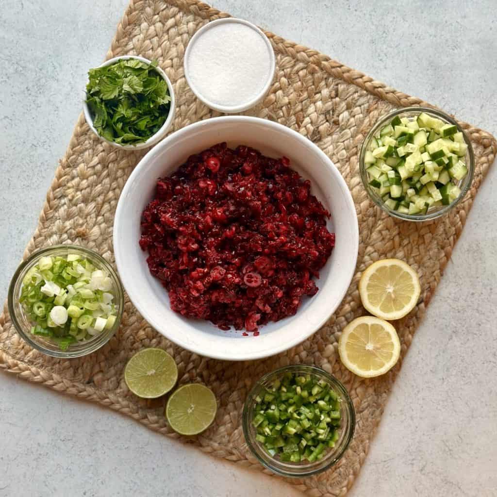 The ingredients displayed for jalapeno cranberry salsa.