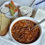 A bowl of school chili on a tray.