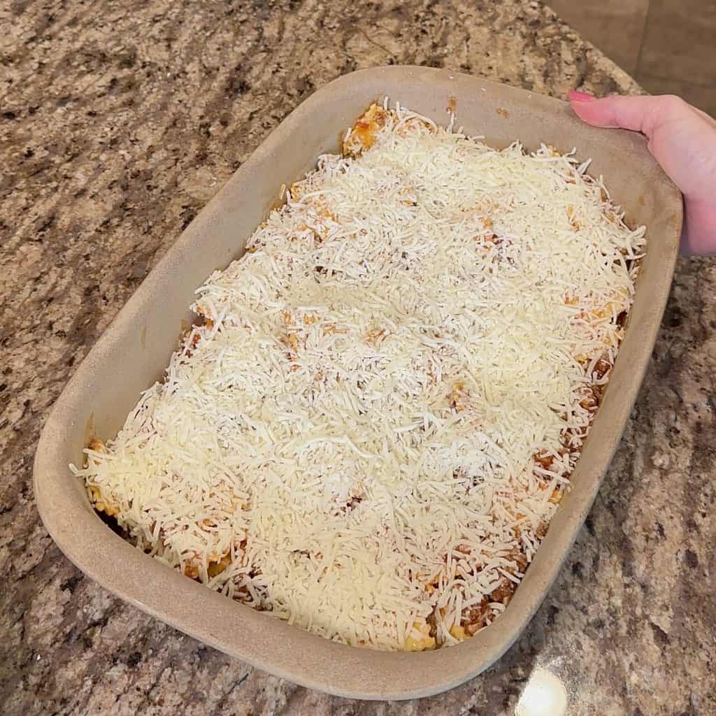 ravioli, sauce, cheese and beef ready to go into the oven