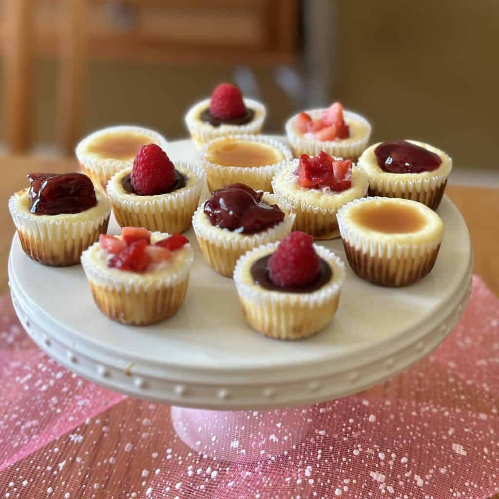 A decorative plate of one bite cheesecakes