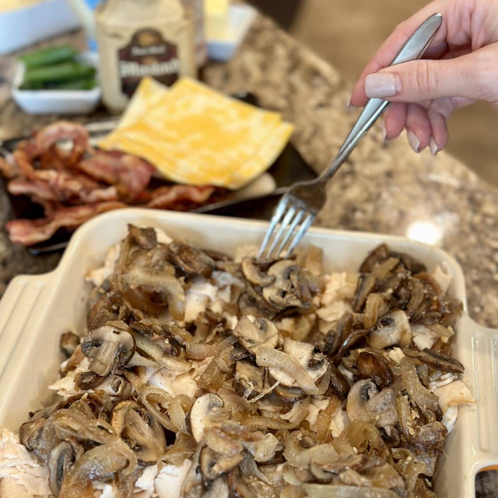 onion and mushroom mixture in a baking dish