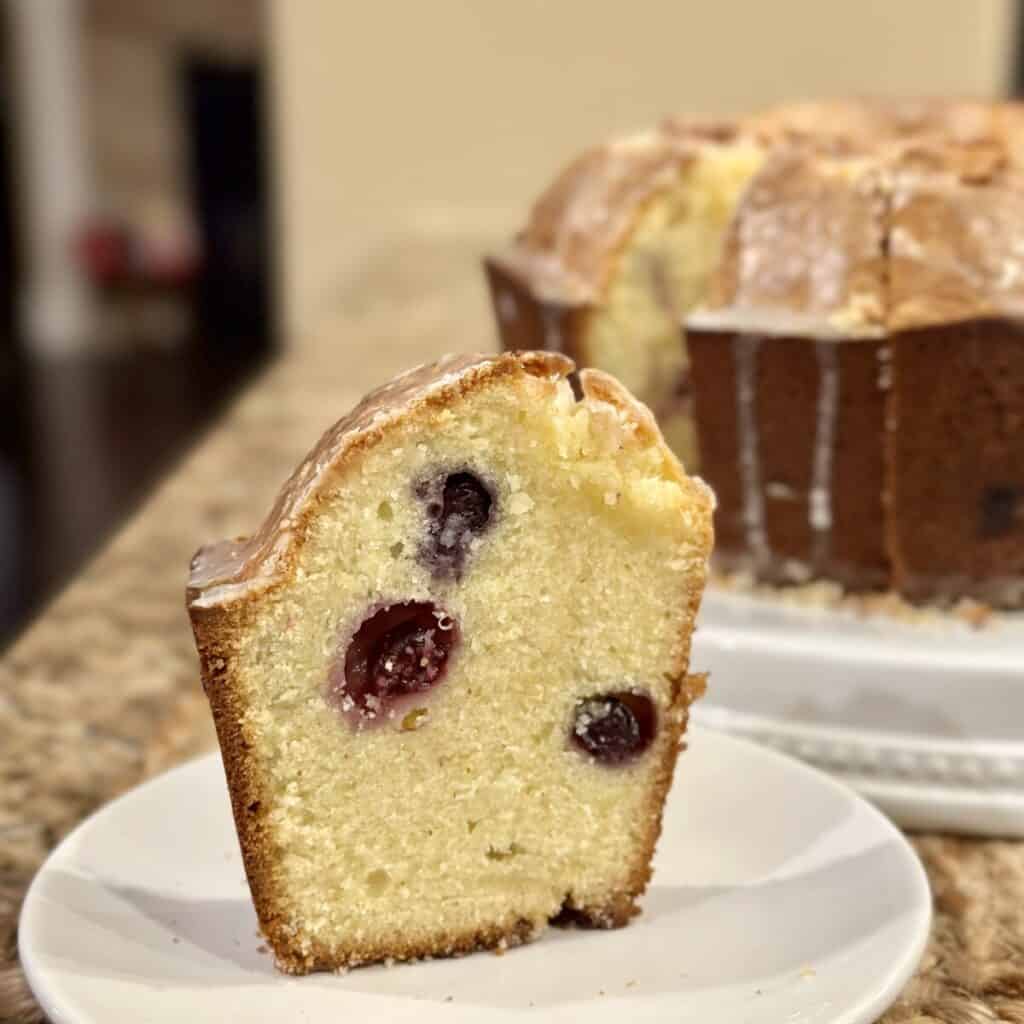 A slice of lemon blueberry pound cake. 