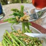 A forkful of gremolata asparagus.