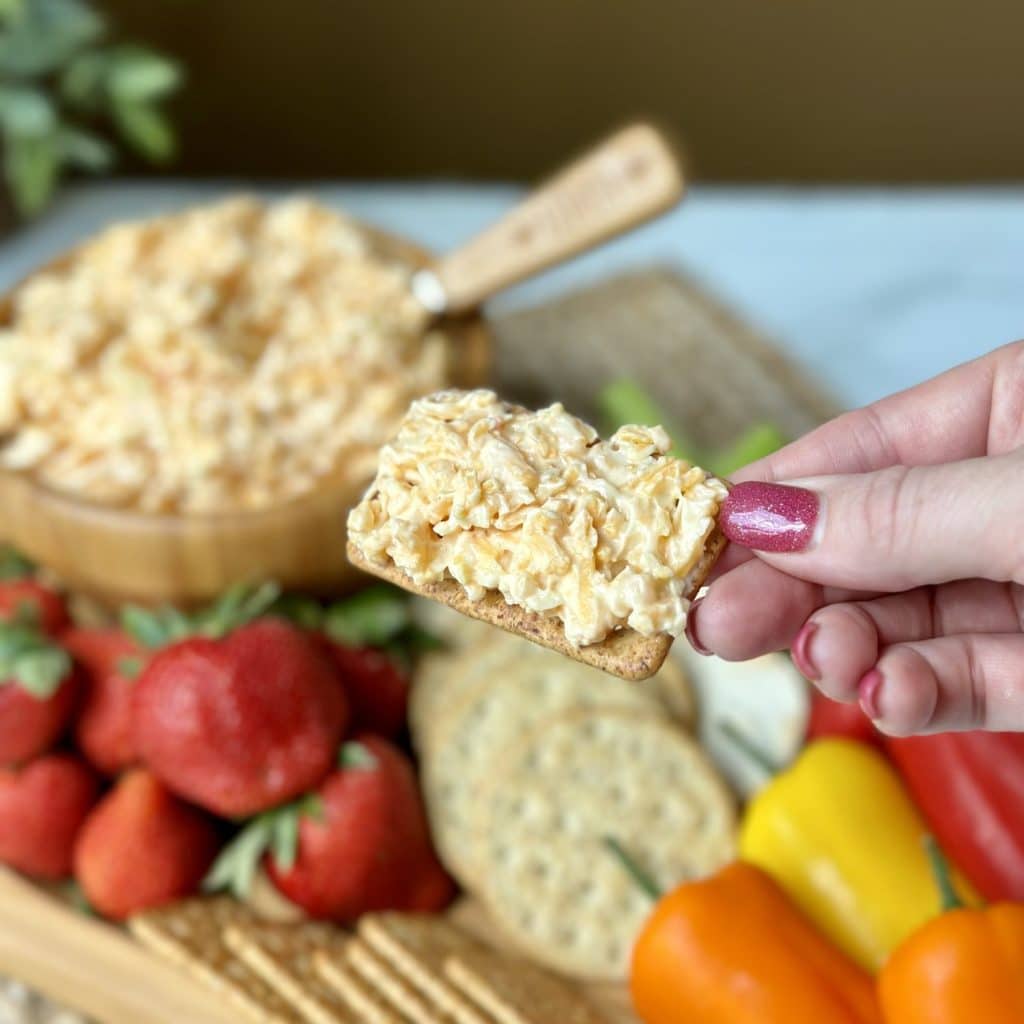 Pimento cheese spread on a cracker.