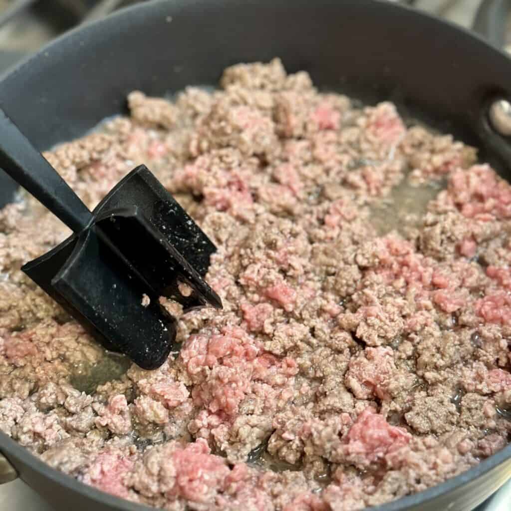 Browning beef in a skillet. 