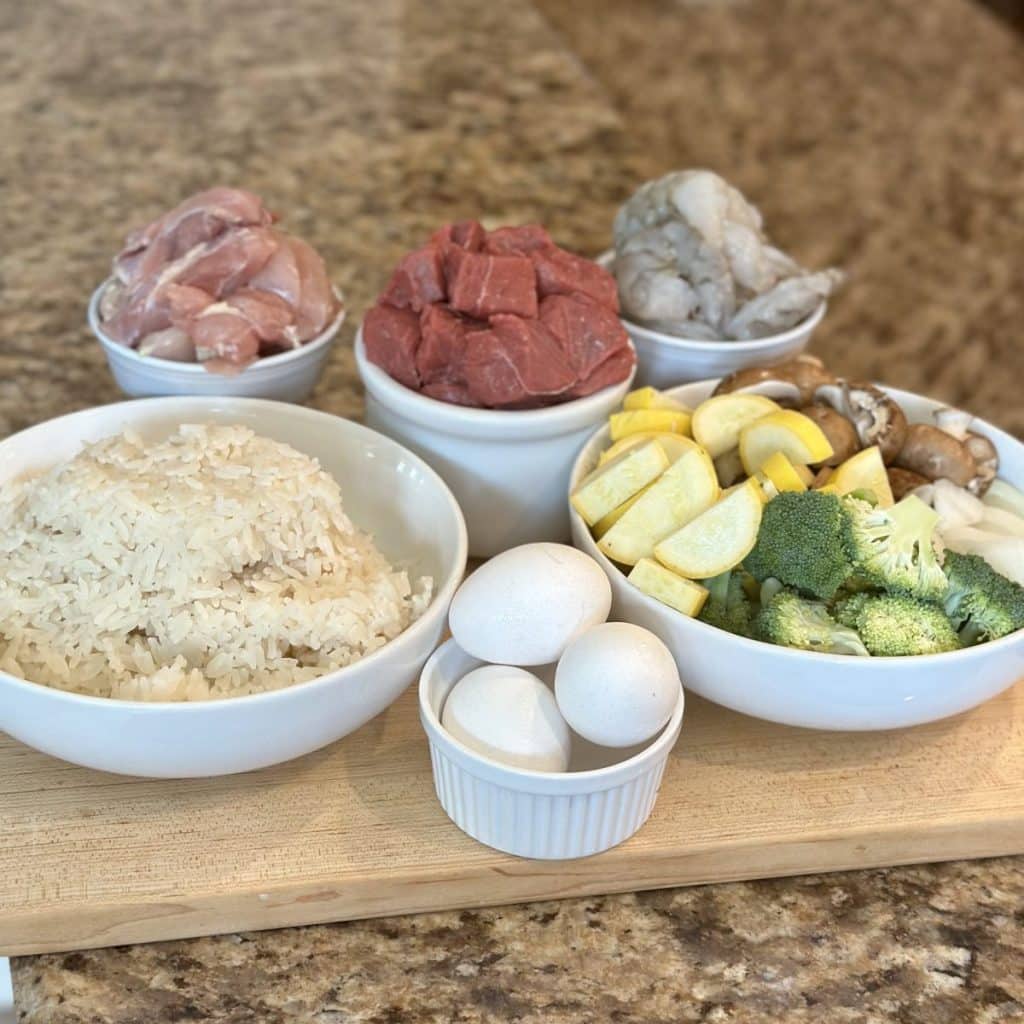 Ingredients to make a meat, rice and veggie hibachi meal.