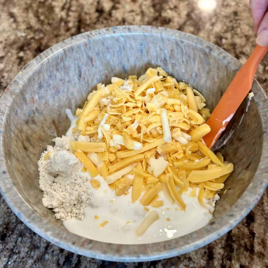 Cheese in flour in a bowl.