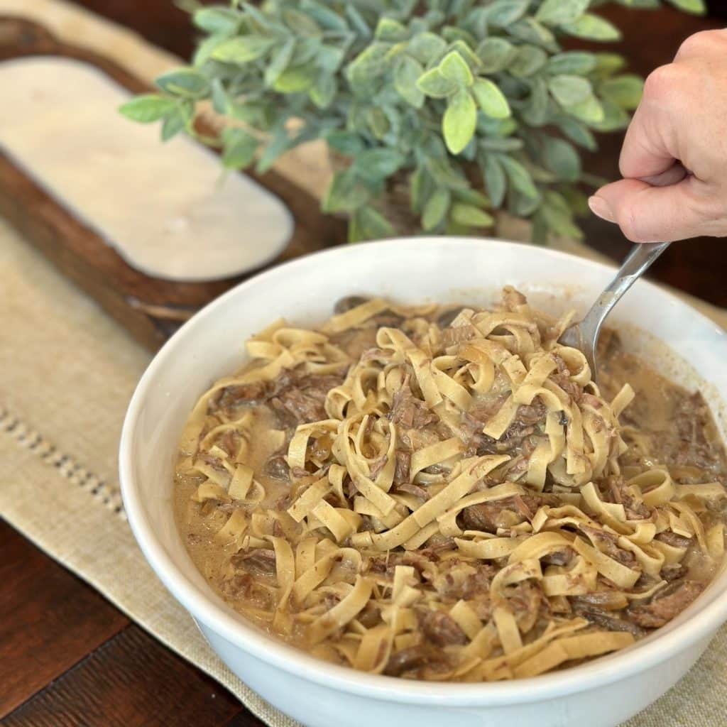 A bowl of beef stroganoff.