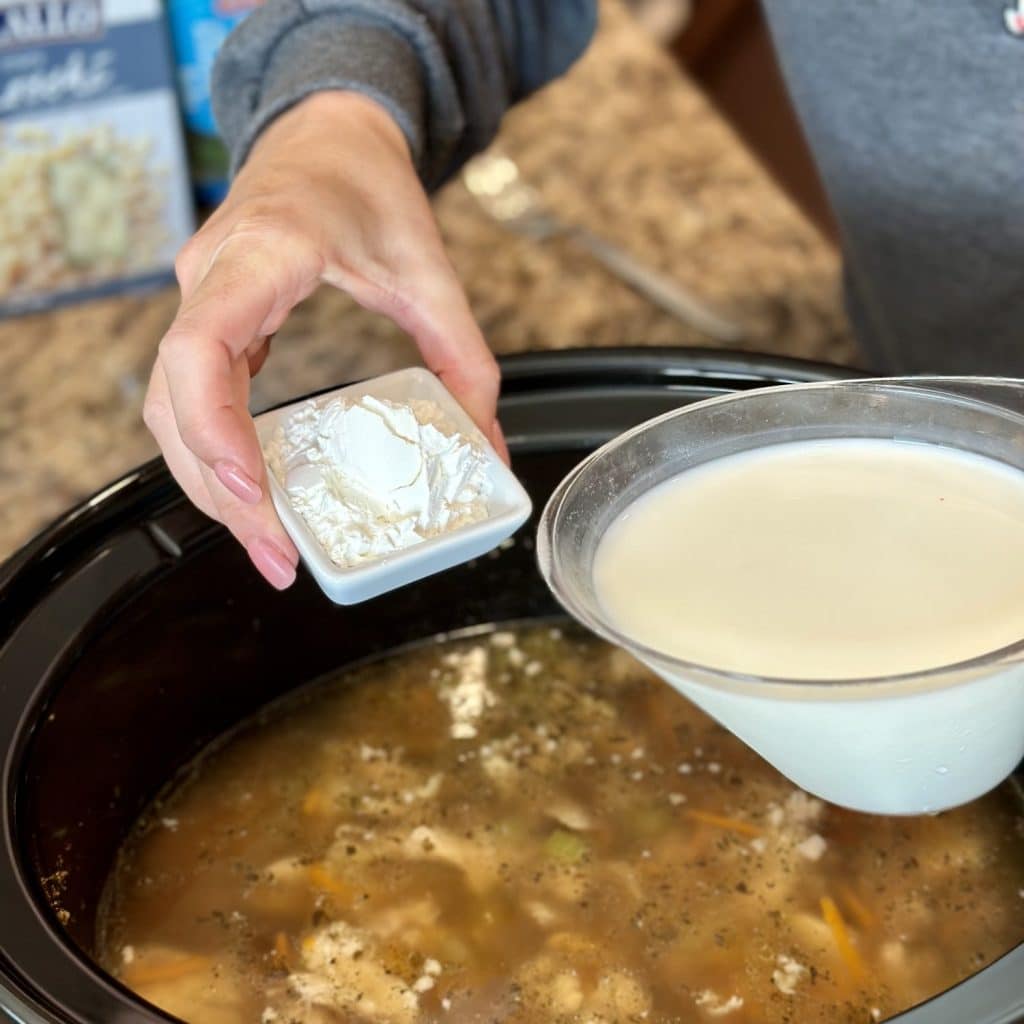 Mixing together milk and cornstarch to add to a crockpot.