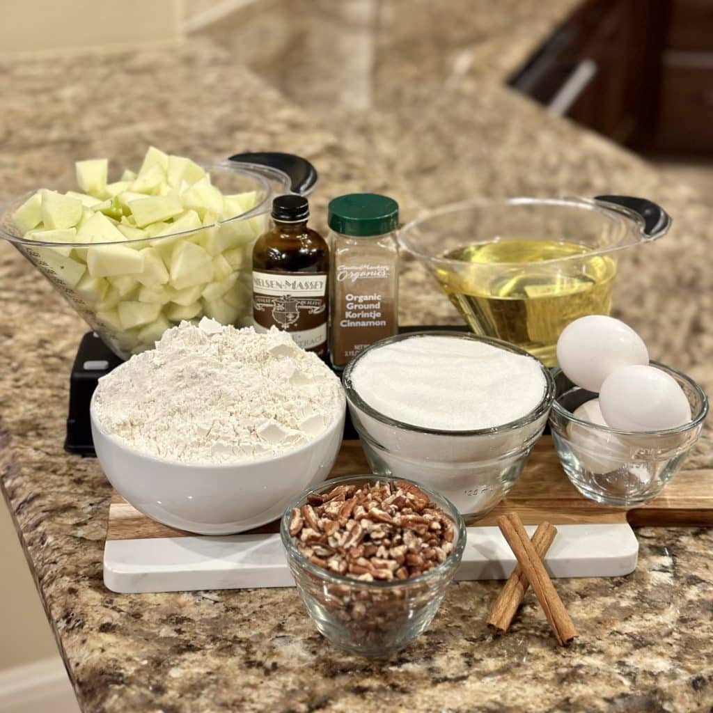 The ingredients to make an apple cake.