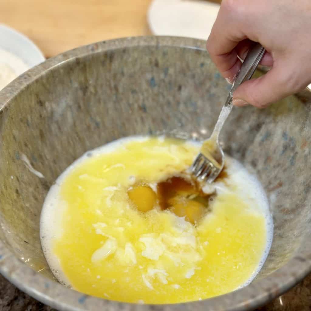 Wet ingredients in a bowl for muffins.