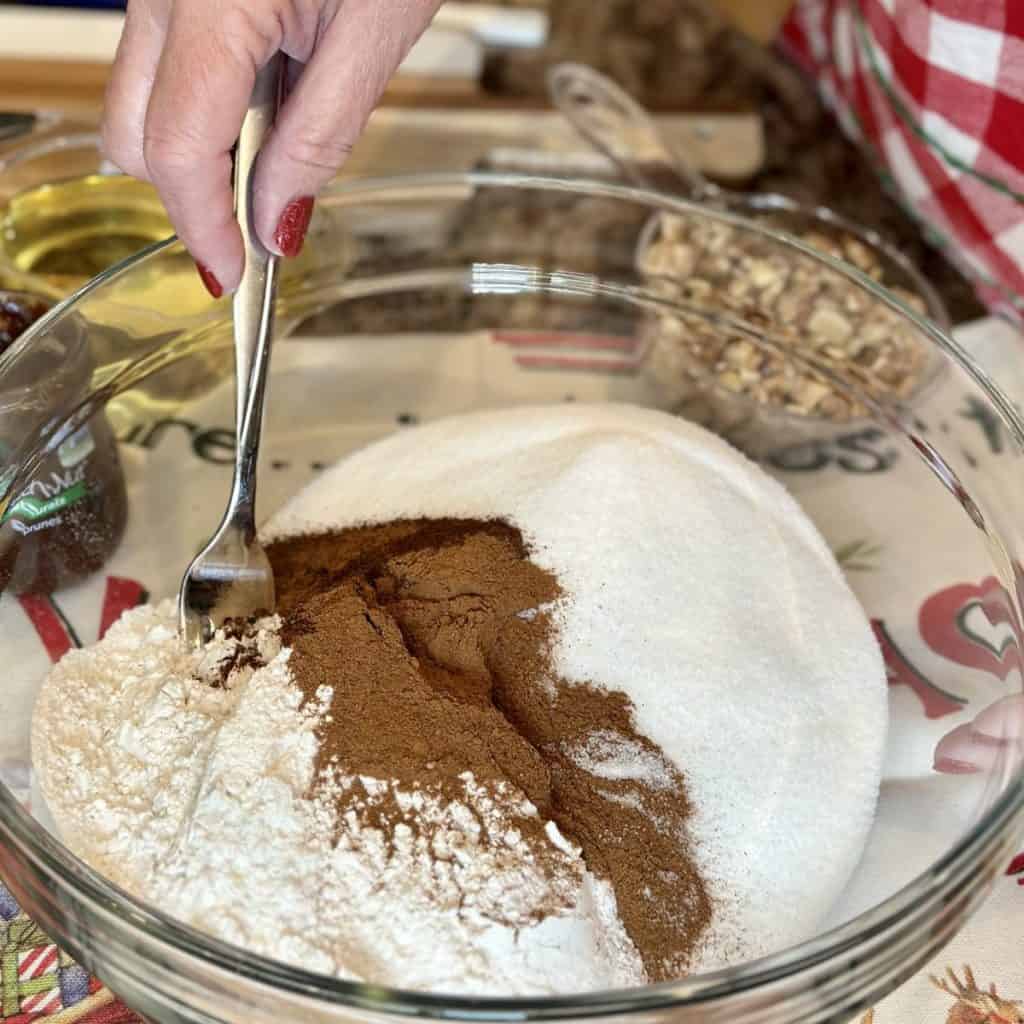 Dry ingredients in a bowl for spice cake.