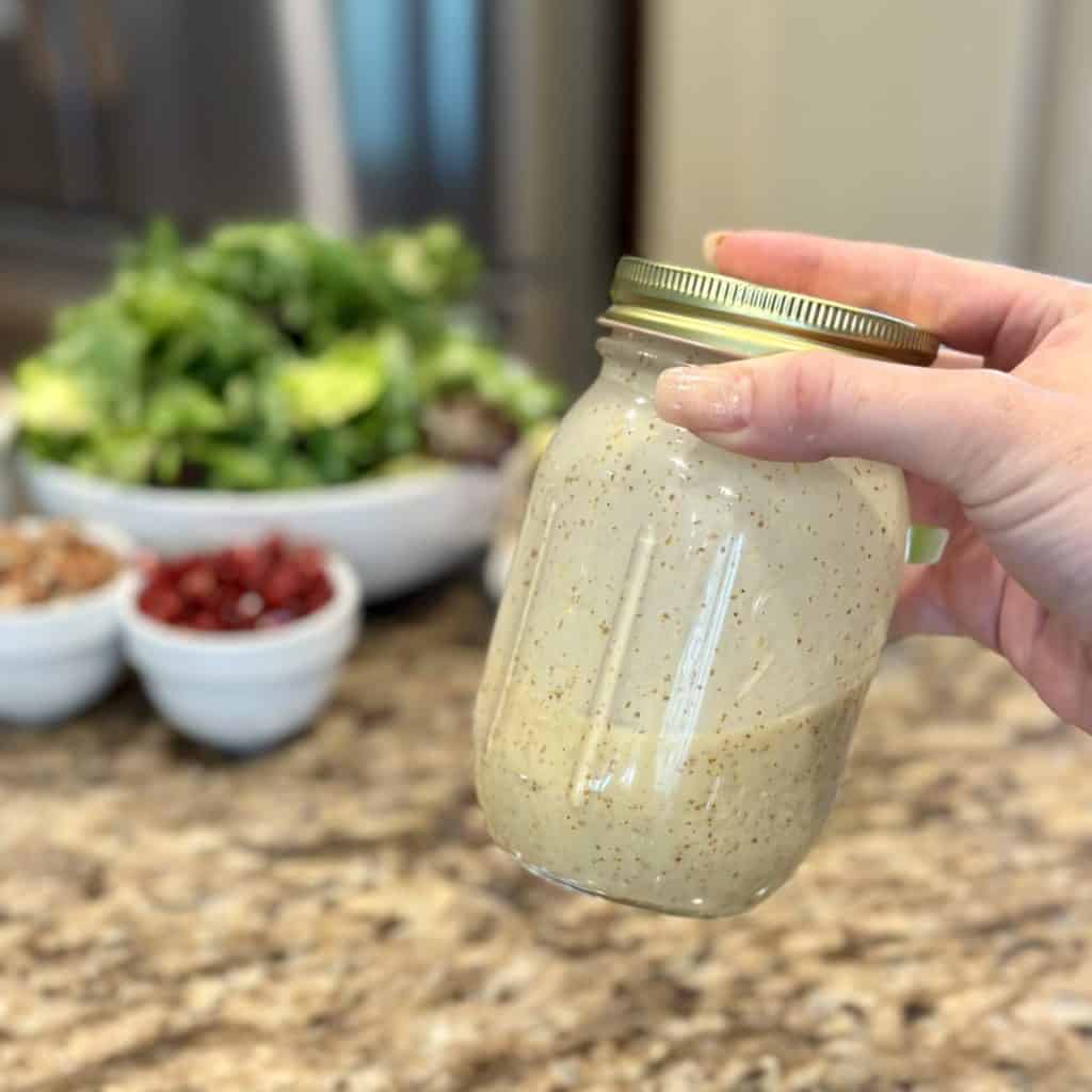 Emulsifying dressing in a jar.