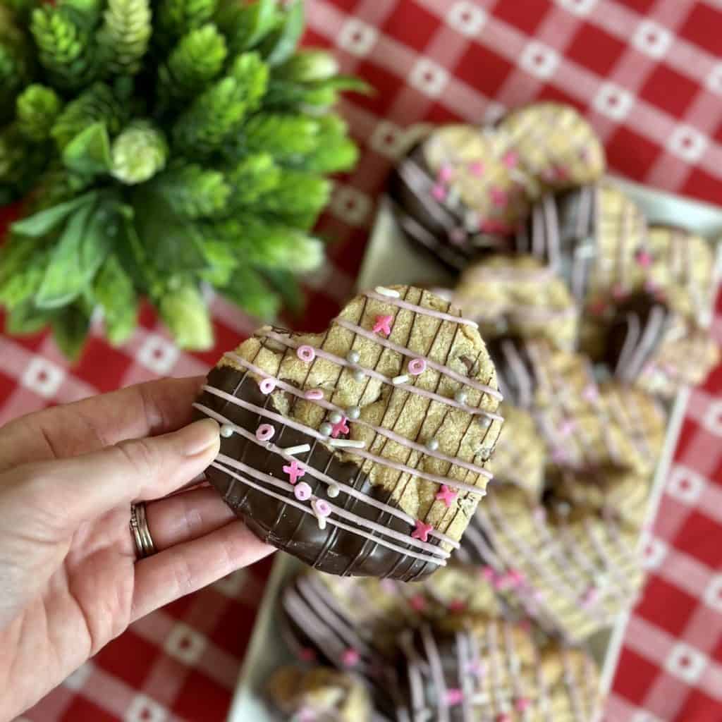 A chocolate drizzled chocolate chip cookie.