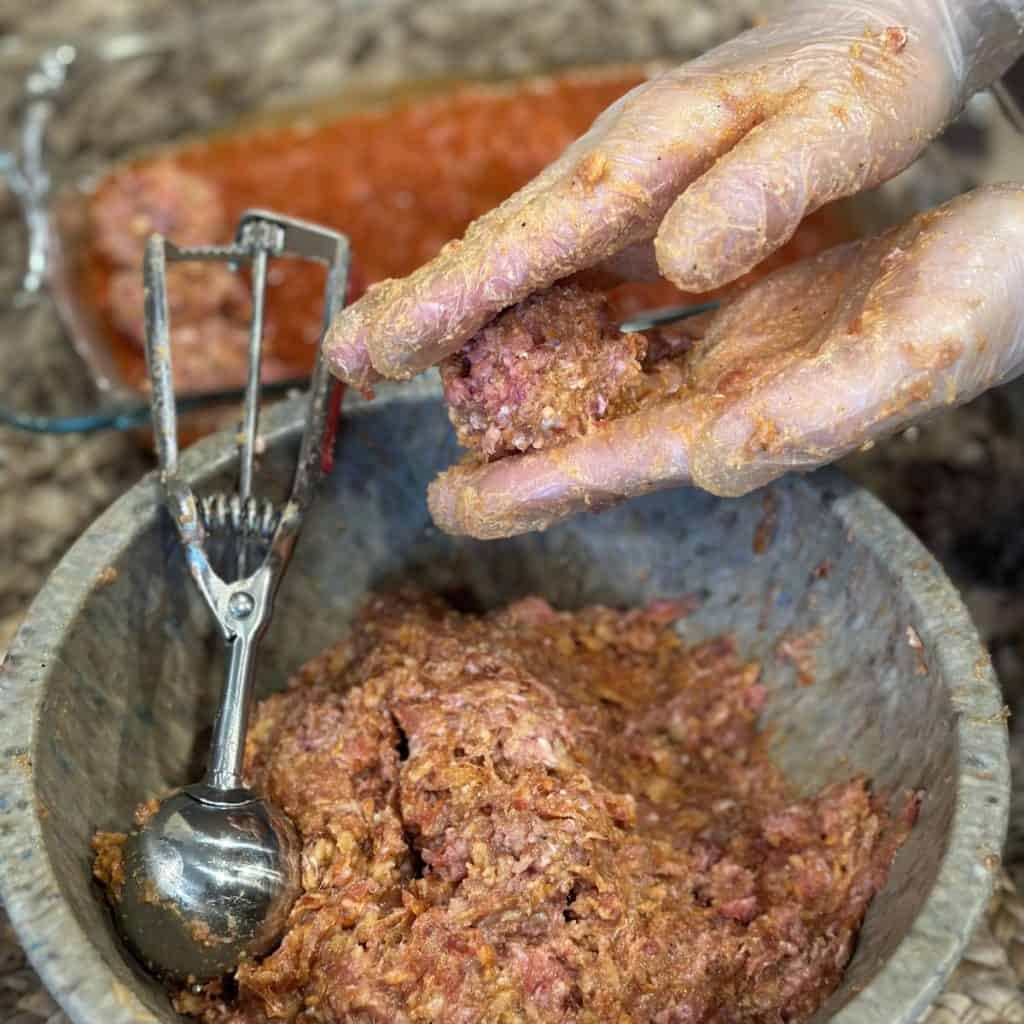 Scoop and rolling meatballs.