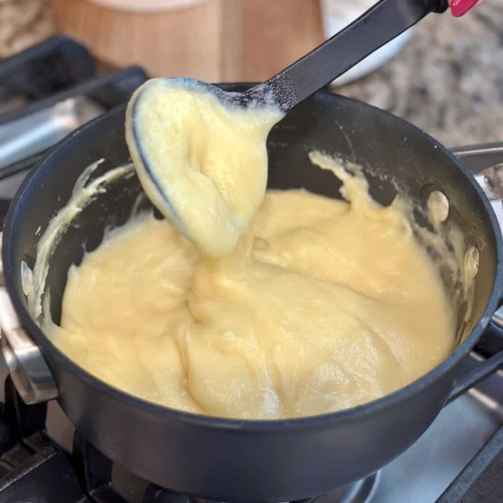 Thickened pudding in a saucepan.