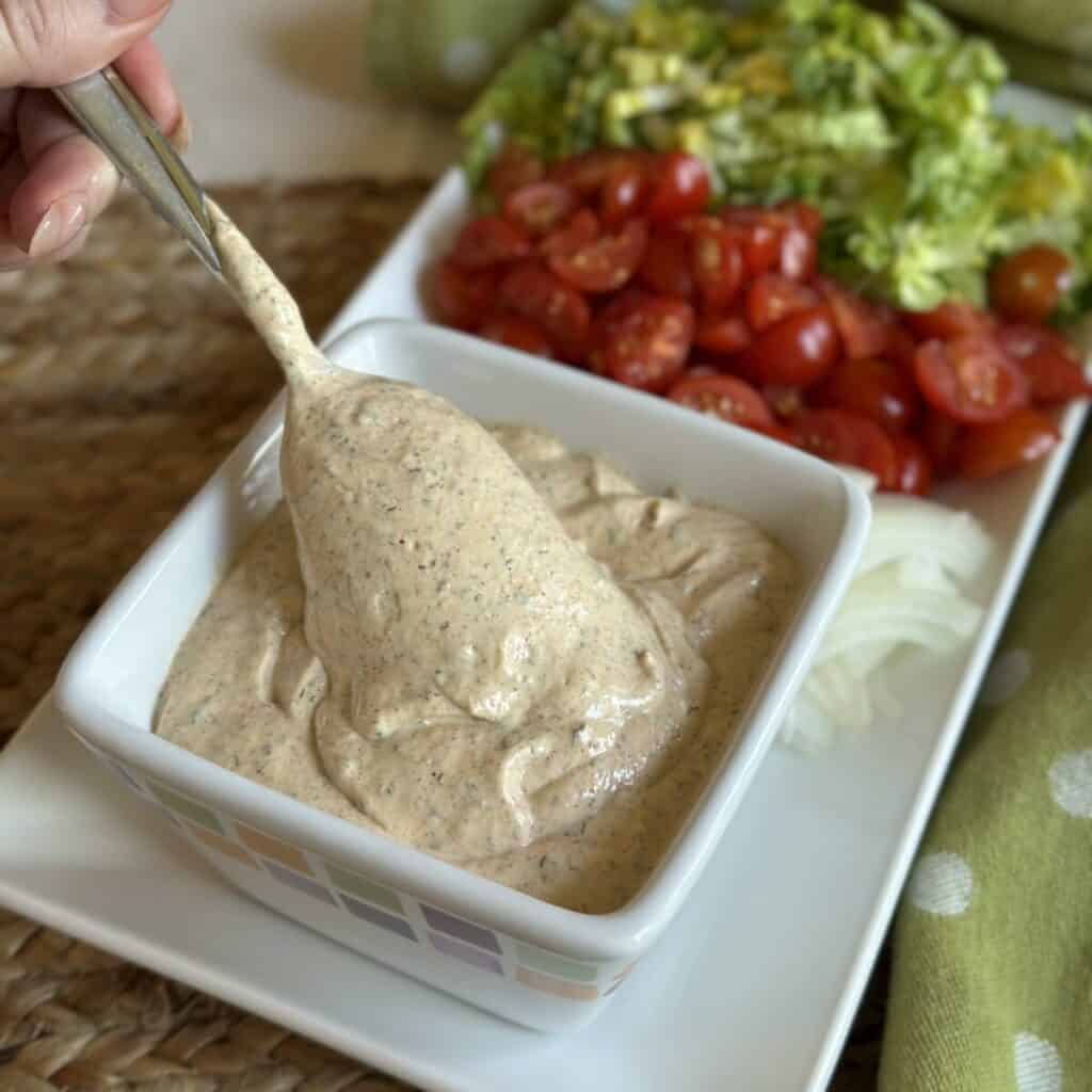 A bowl of blackened ranch sauce.