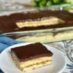 A slice of no bake eclair cake on a saucer.