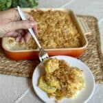 Getting a bite with a fork of squash casserole.