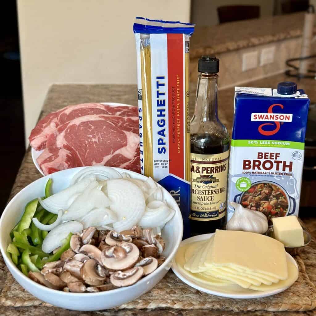 The ingredients to make cheesesteak pasta.