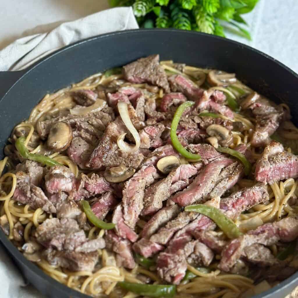 A pan of cheesesteak pasta.