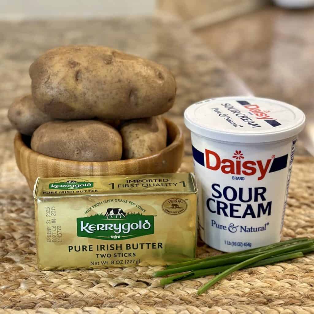 The ingredients to make sour cream mashed potatoes.