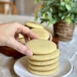 Grabbing a tea cake cookie.