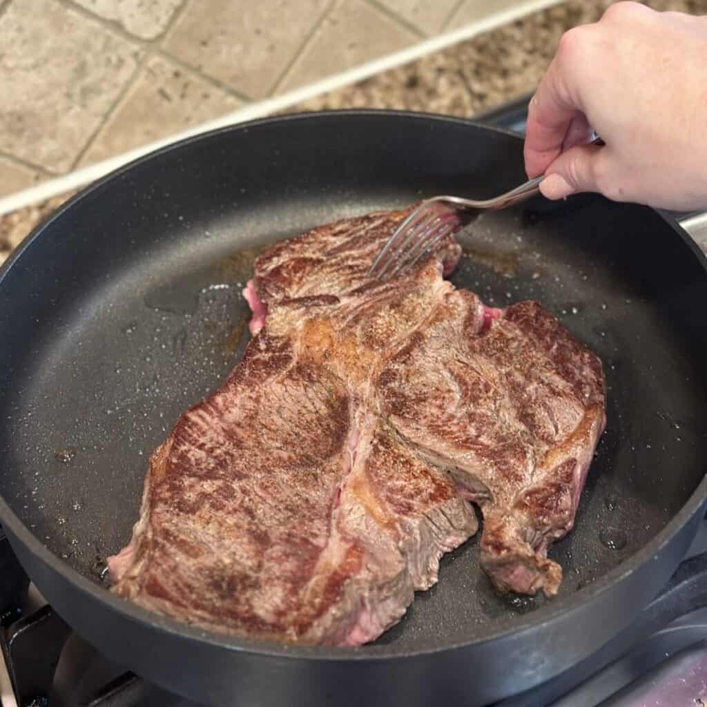 Searing a roast in a crockpot.