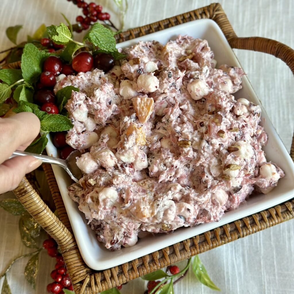 A bowl of cranberry fluff salad.