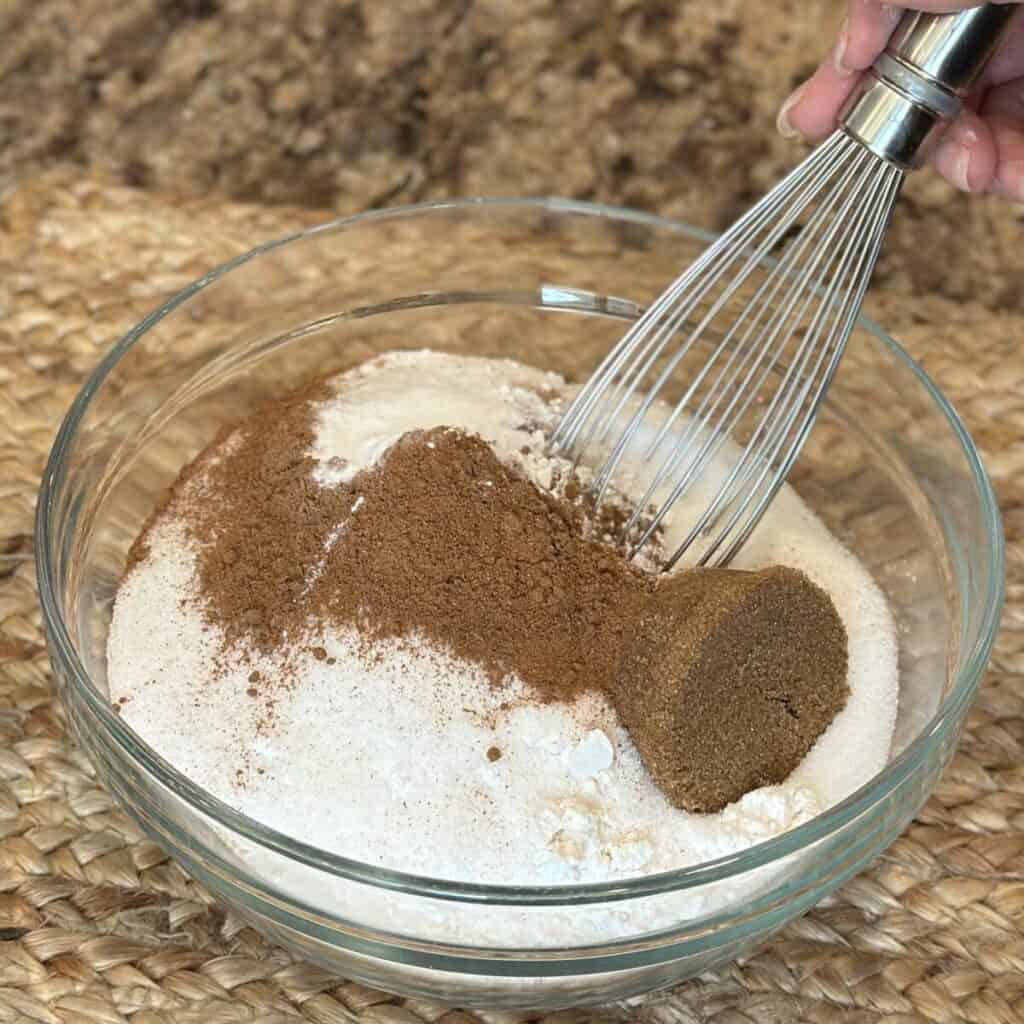 Mixing the dry ingredients for pumpkin coffee cake.