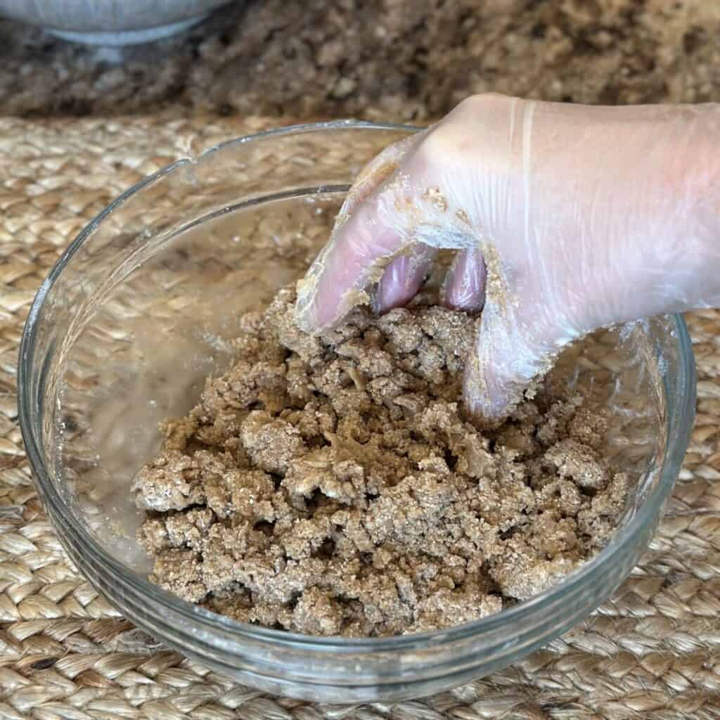 Making streusel for the top of a pumpkin coffee cake.