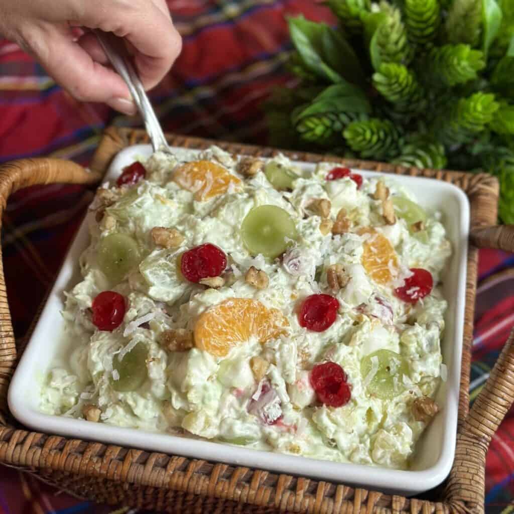 A bowl of pistachio ambrosia salad.